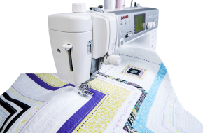 Janome Memory Craft 6700P Sewing and Quilting Machine