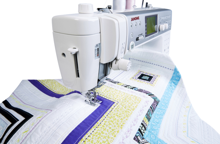 Janome Memory Craft 6700P Sewing and Quilting Machine